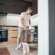 man using the dishwasher