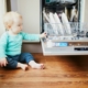 little-child-helping-to-unload-dishwasher