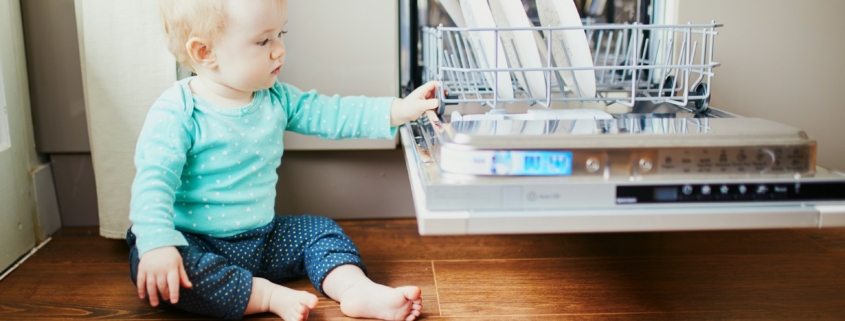 little-child-helping-to-unload-dishwasher