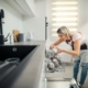 a-tidy-woman-putting-dishes-into-a-dishwasher